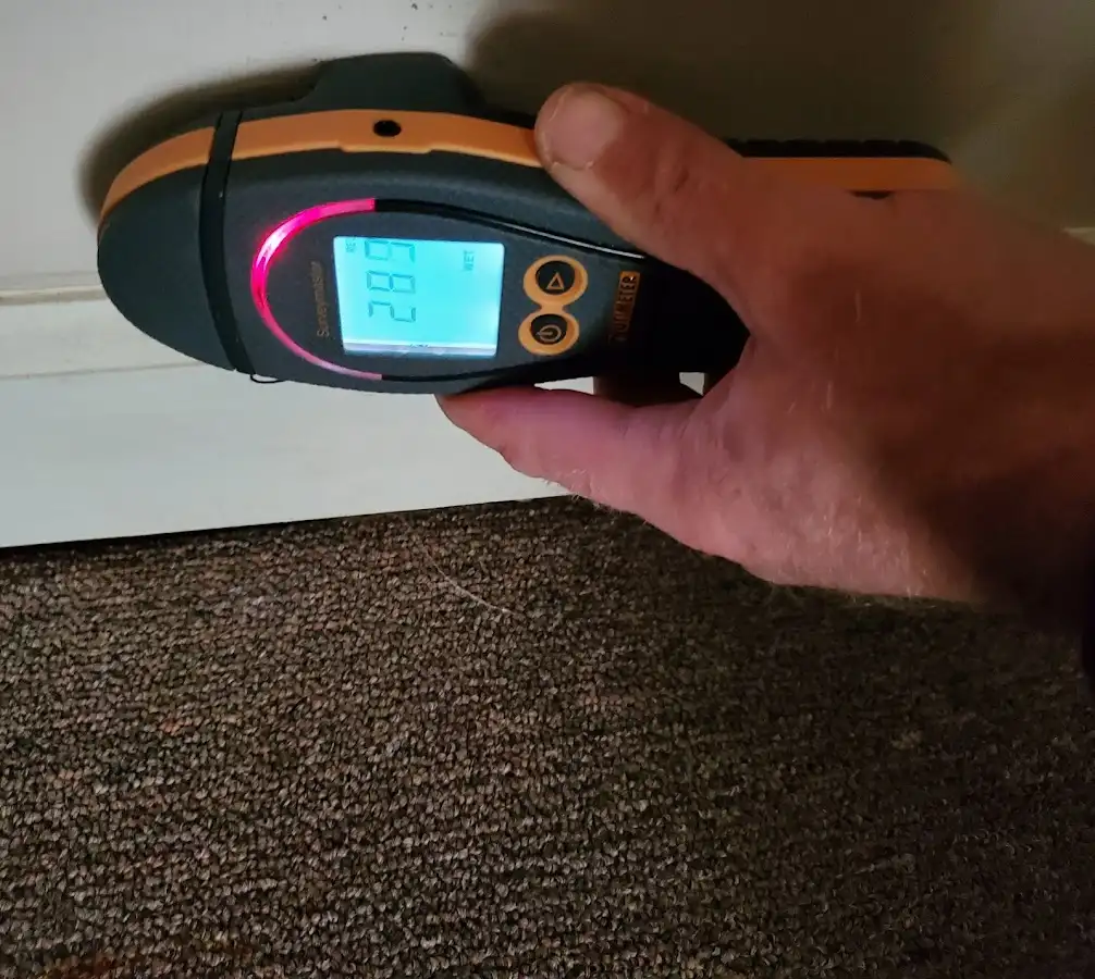 Moisture detection at baseboard during Burst Pipe Cleanup in Lewisboro